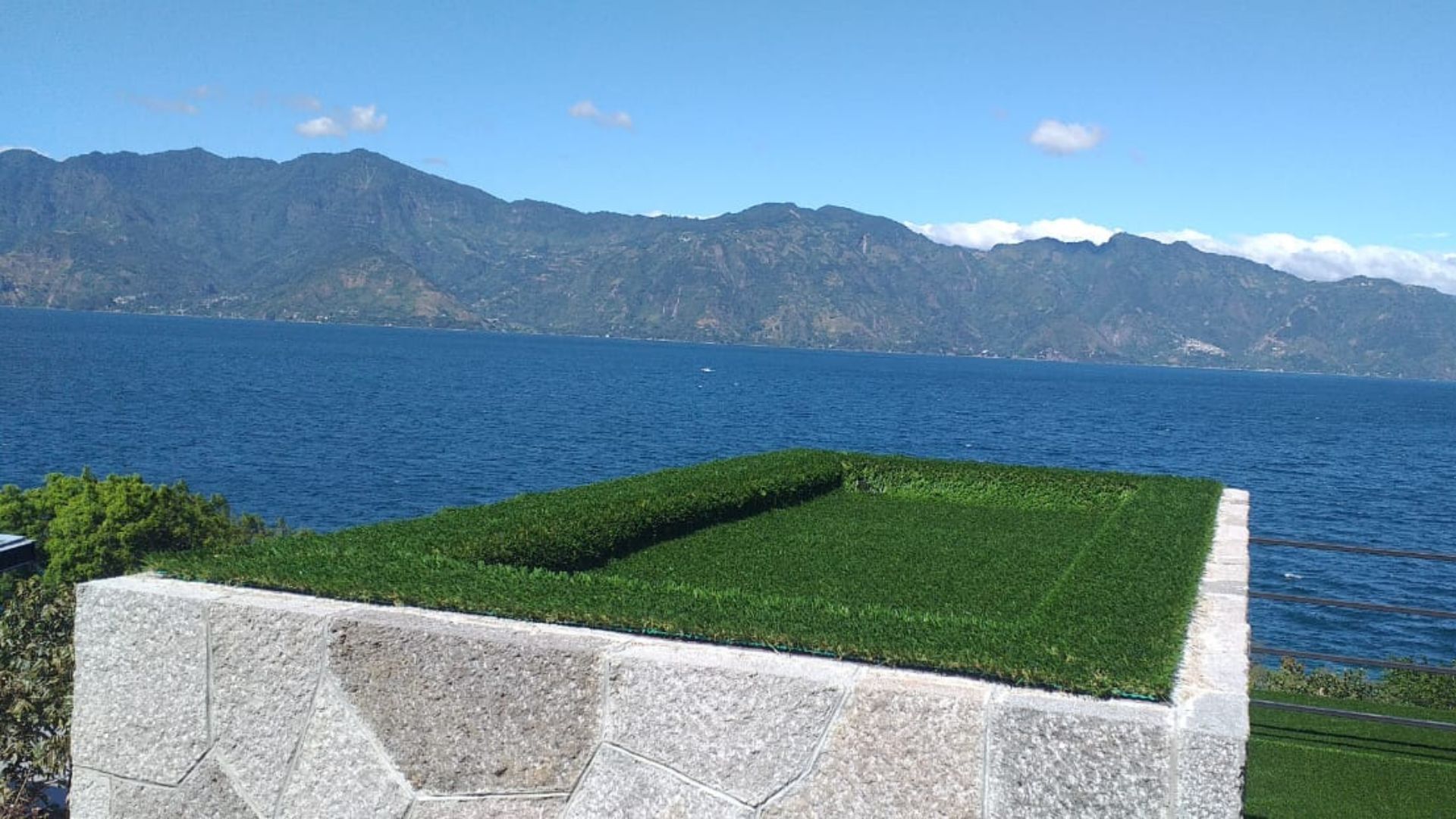 Guatemala Lakefront property with mountain in background