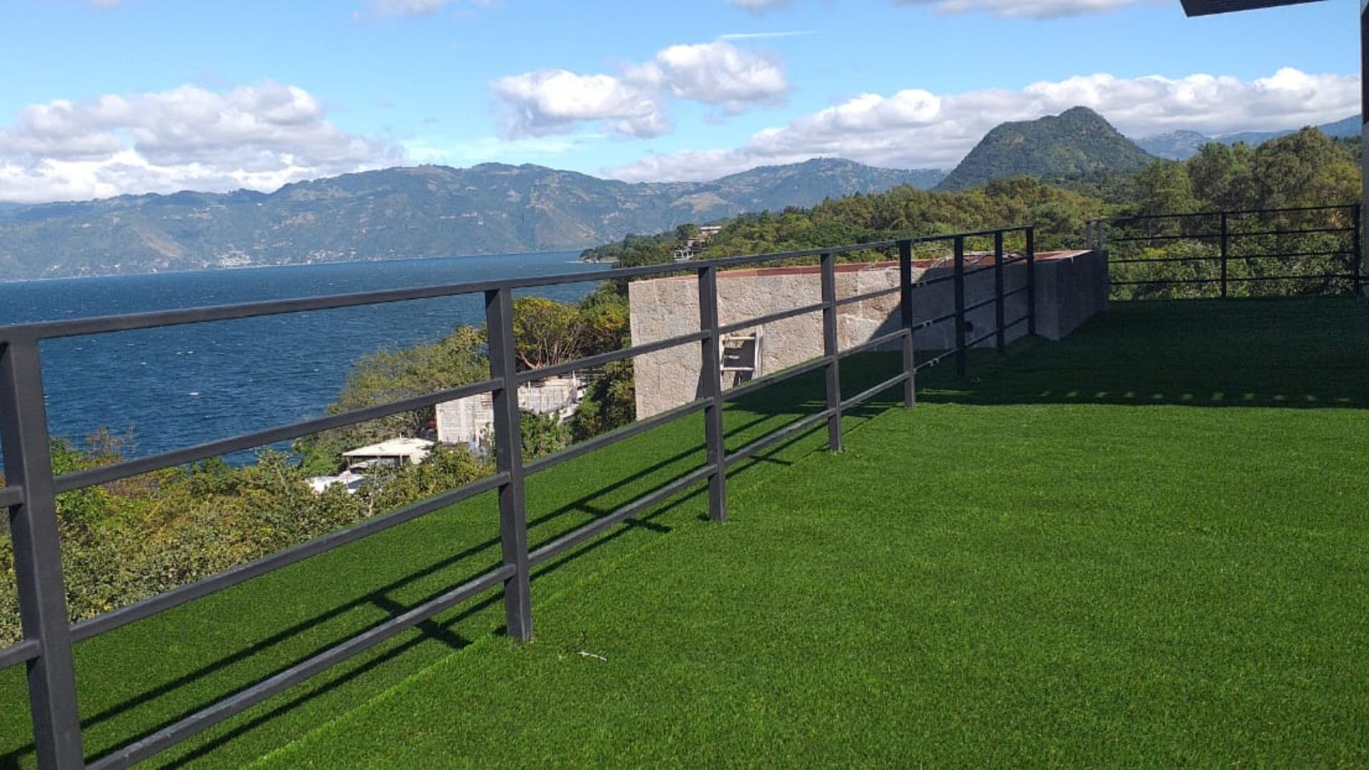 Guatemala Lakefront property with mountain in background